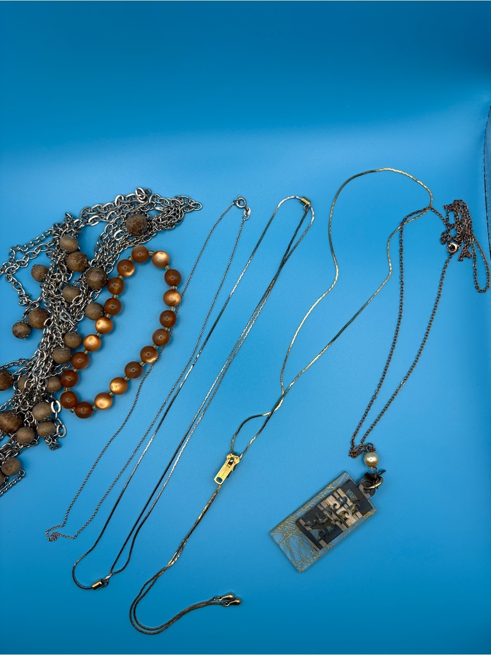 Gold-Tone Pendant Necklace with Brown Bead Accents
